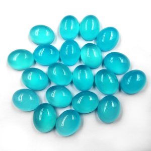 Paraiba Chalcedony Cabochon Shape Calibrated All Size 4x6mm To 15x20mm Oval Cabochon Stone Calibrated Natural Gemstone For jewelry Making Specification: Stone Name- Paraiba Chalcedony Stone Size - 4x6mm,5x7mm,6x8mm,7x9mm,8x10mm,9x11mm,10x12mm,10x14mm,12x16mm,13x18mm,15x20mm Stone Shape - Oval Shape