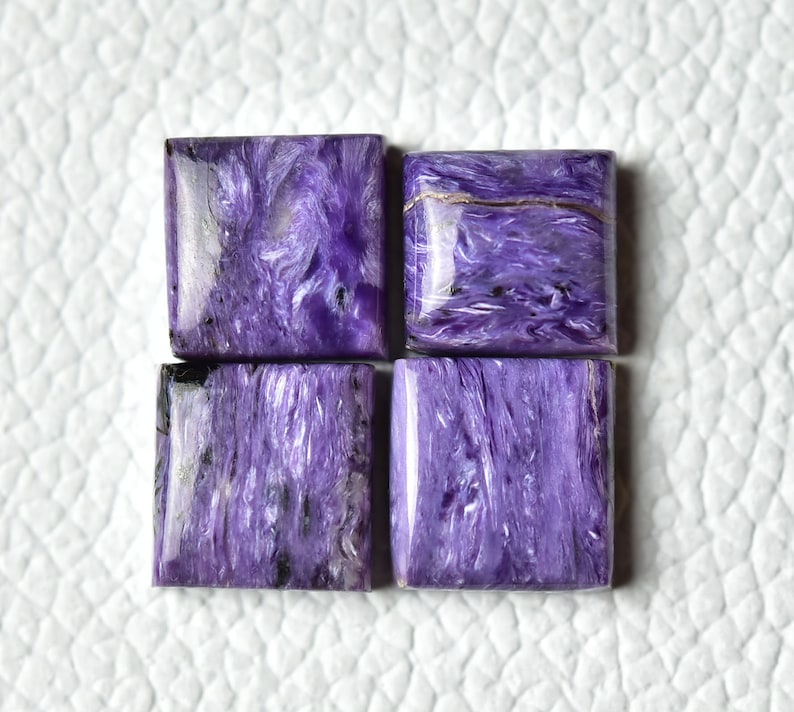 A distinctive and uncommon violet gemstone, charoite is exclusively discovered in a region of Siberia, Russia. It is swirling with white, black, and occasionally other colours in different hues of purple.